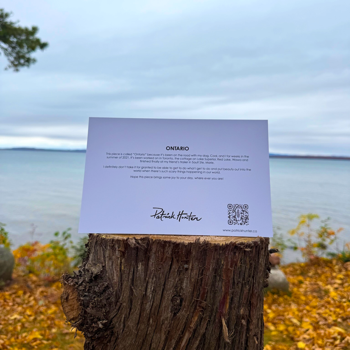 The back of a greeting card with painting title, excerpt, Patrick's signature, and website details.