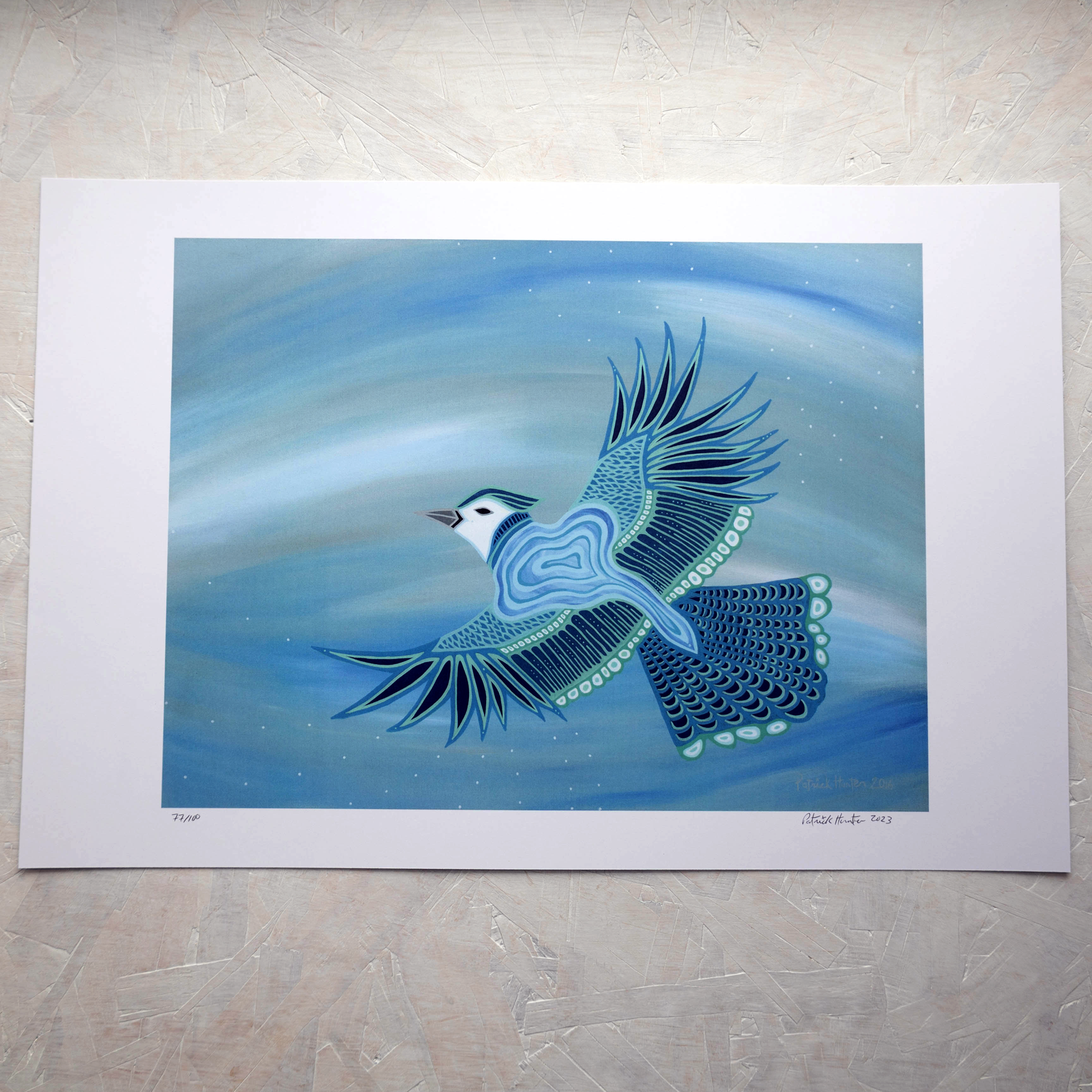 Print of Patrick Hunter's painting of a blue jay in flight in woodland art style.