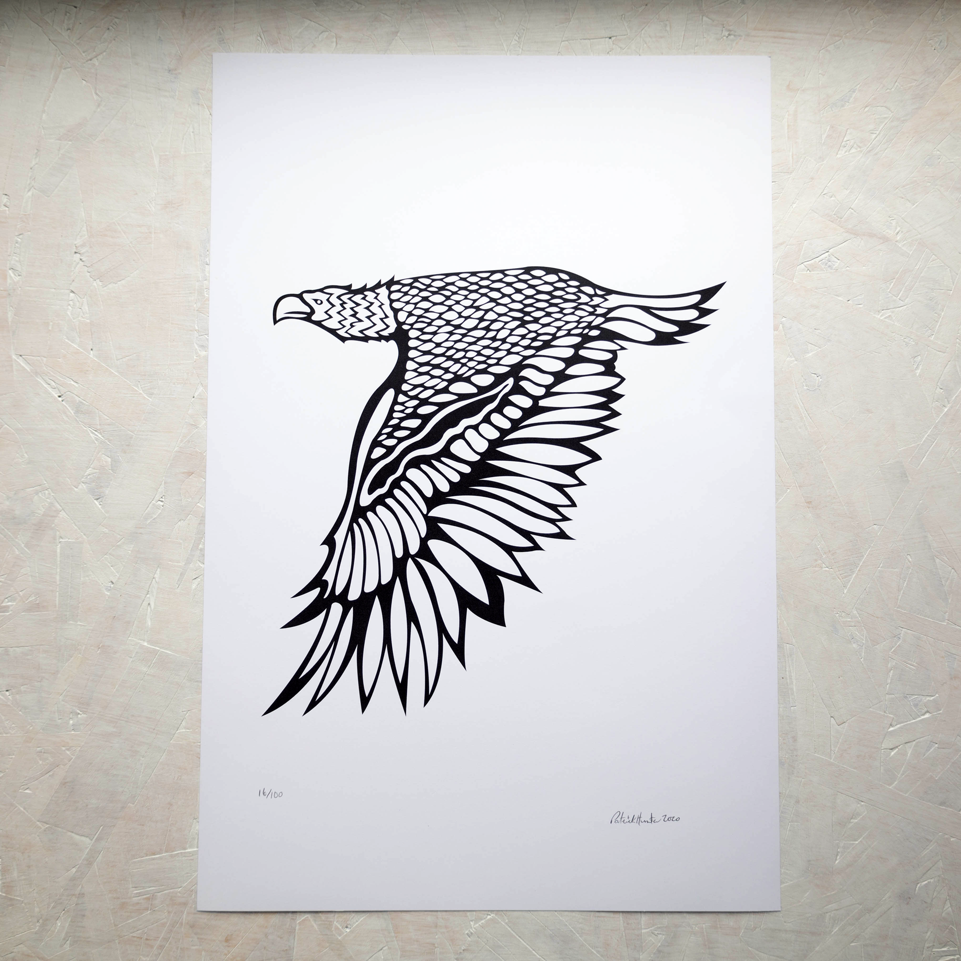 Print of Patrick Hunter's painting of an eagle in flight in black and white, woodland art style.