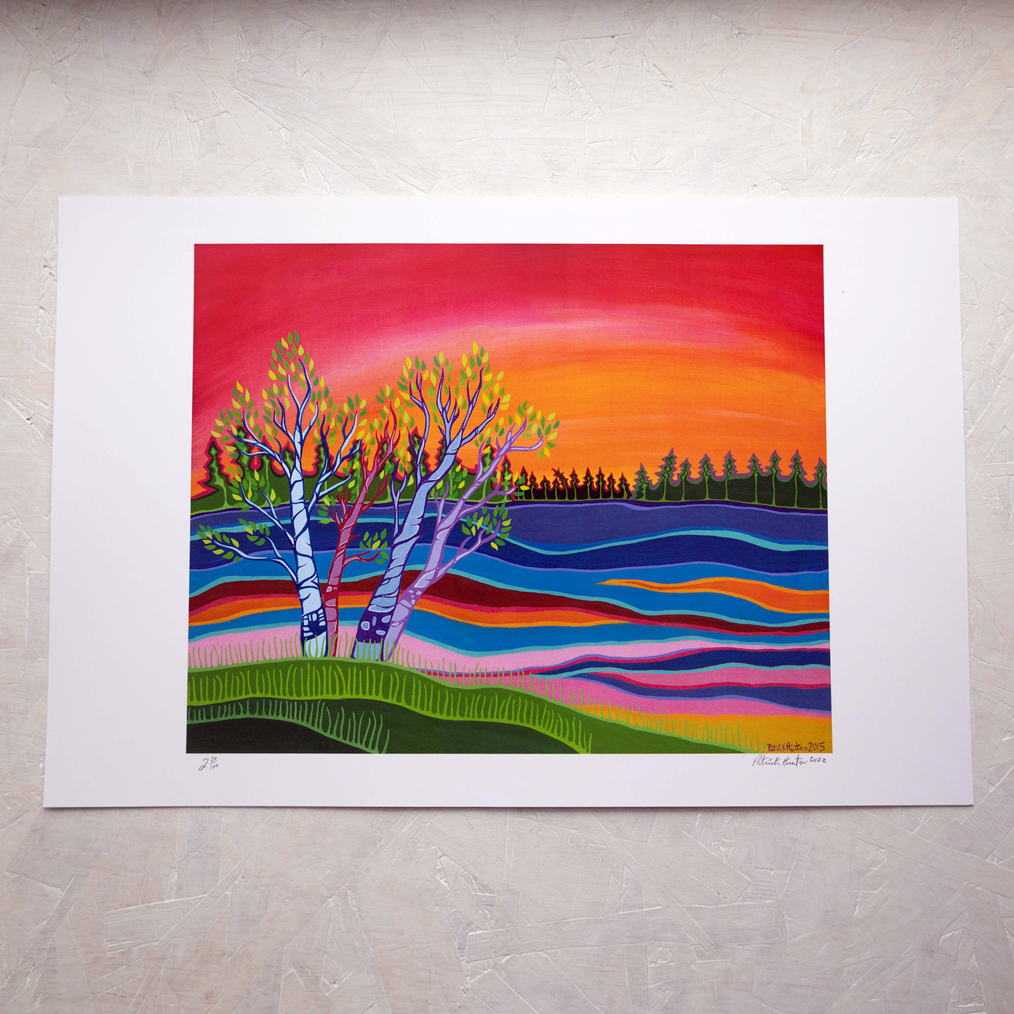Print of Patrick Hunter's painting of Keesic Bay, bright coloured trees and water in woodland art style.