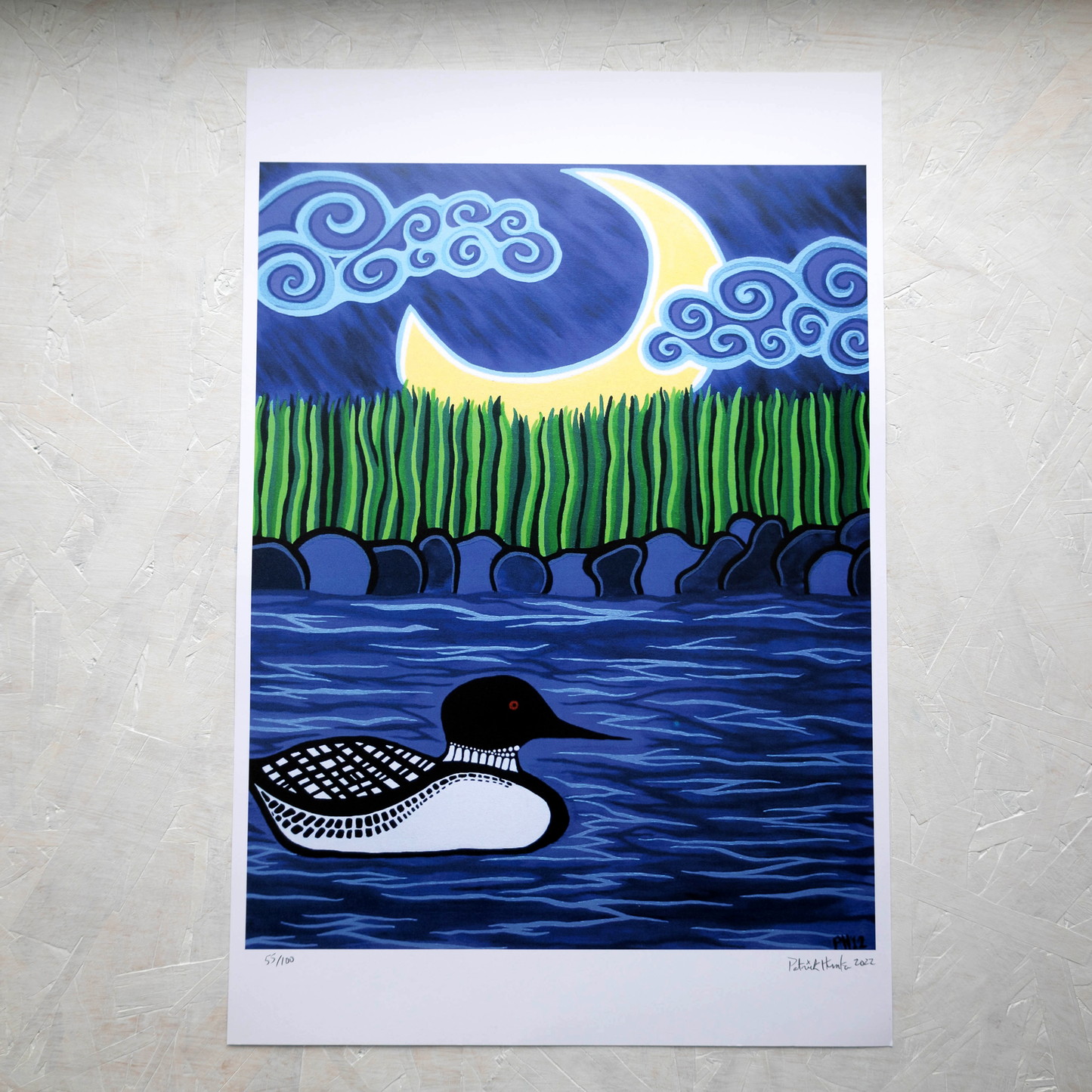 Print of Patrick Hunter's painting of a loon on a lake with crescent moon above, woodland art style.