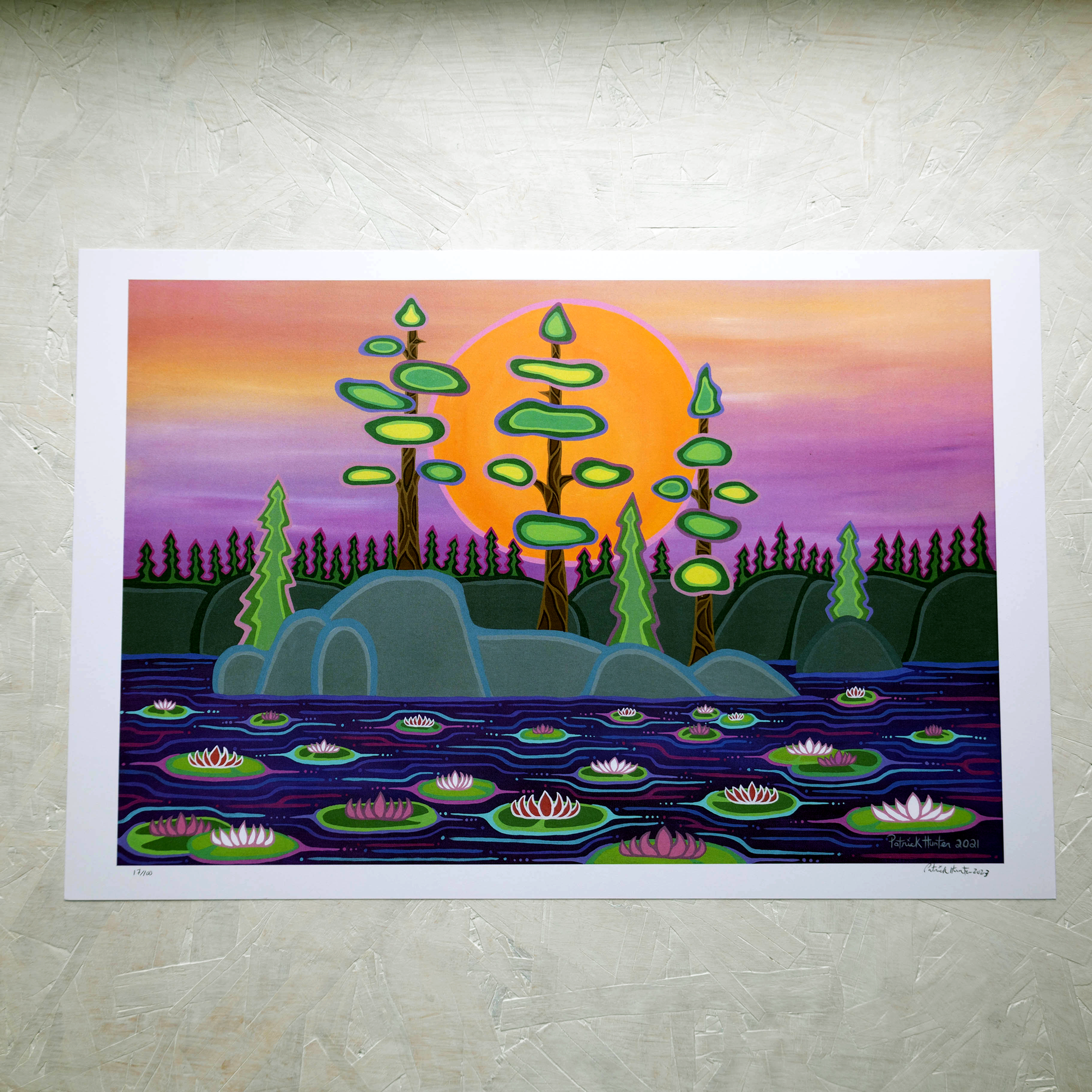 Print of Patrick Hunter's painting of lilypads on water in front of trees, forest, and sun, woodland art style.
