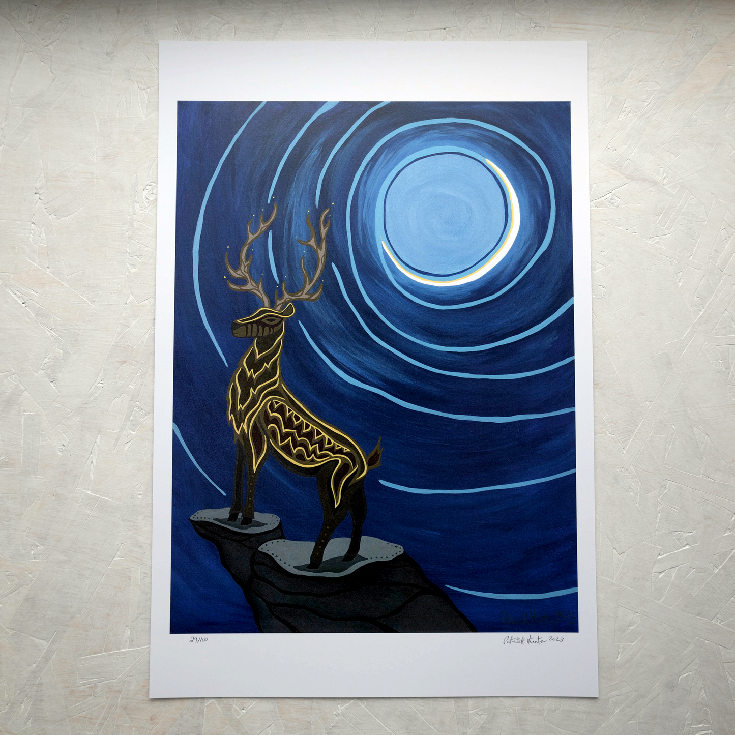 Print of Patrick Hunter's painting of a stag with antlers, poised in front of a crescent moon, woodland art style.