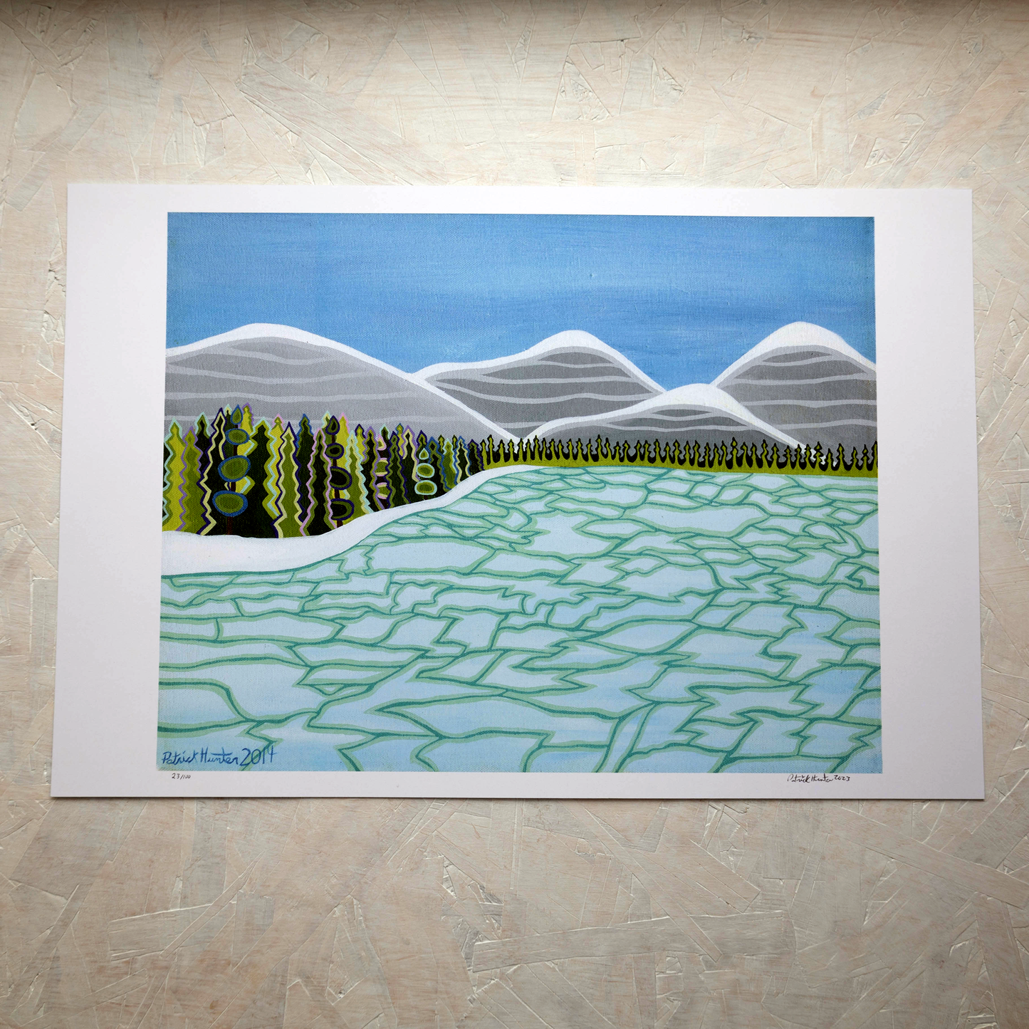 Print of Patrick Hunter's painting of a ice-covered body of water with forest and mountains in the background, woodland art style.