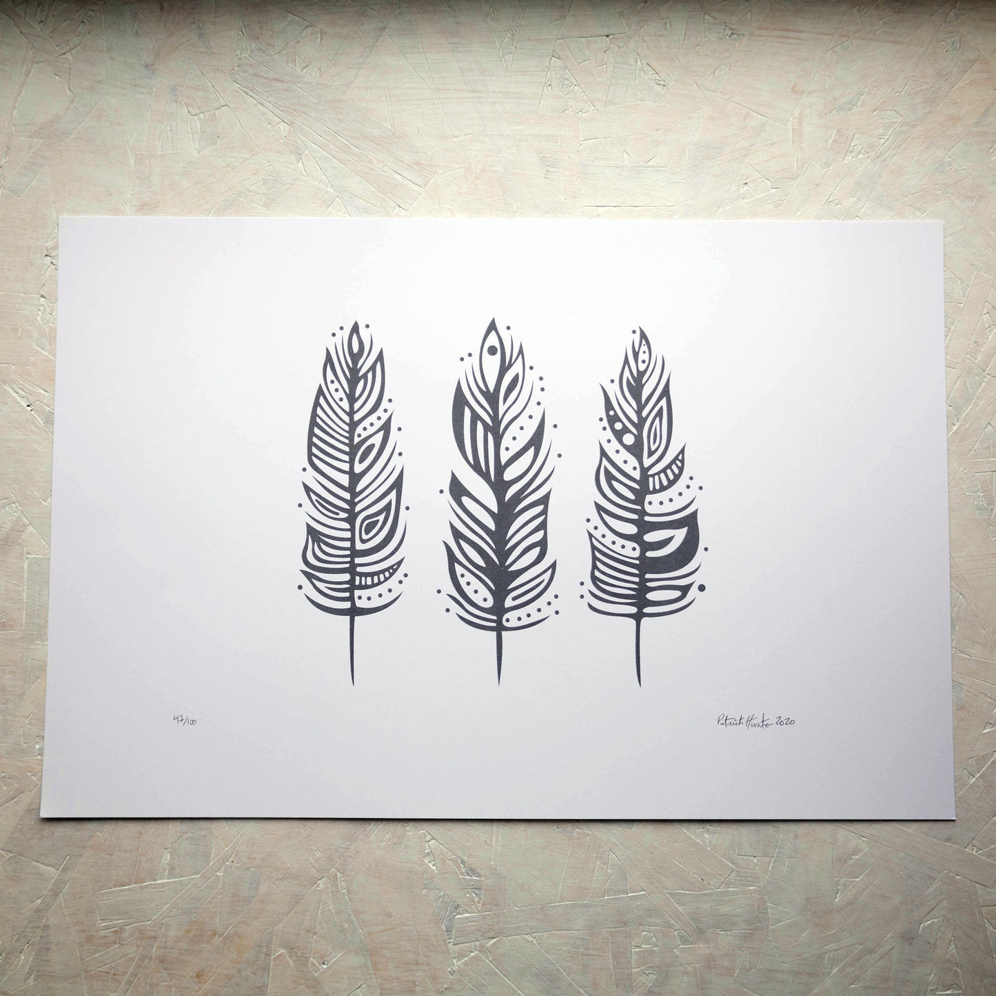 Print of Patrick Hunter's painting of three feathers, grey on white, woodland art style.