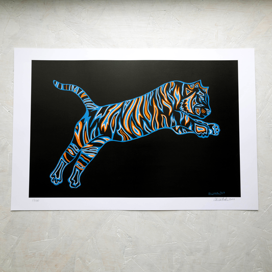 Print of Patrick Hunter's painting of a tiger in blue and orange on black background, woodland art style.