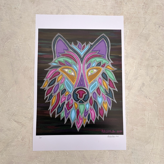 Print of Patrick Hunter's painting, Wolf Mother, consisting of a portrait of a multi-coloured wolf on a dark varigated background with silver elements.