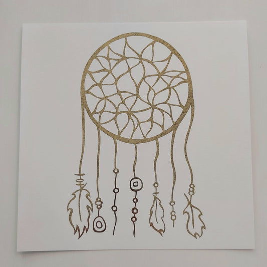 Print of Patrick Hunter's painting of a dreamcatcher in gold leaf on white background, woodland art style.