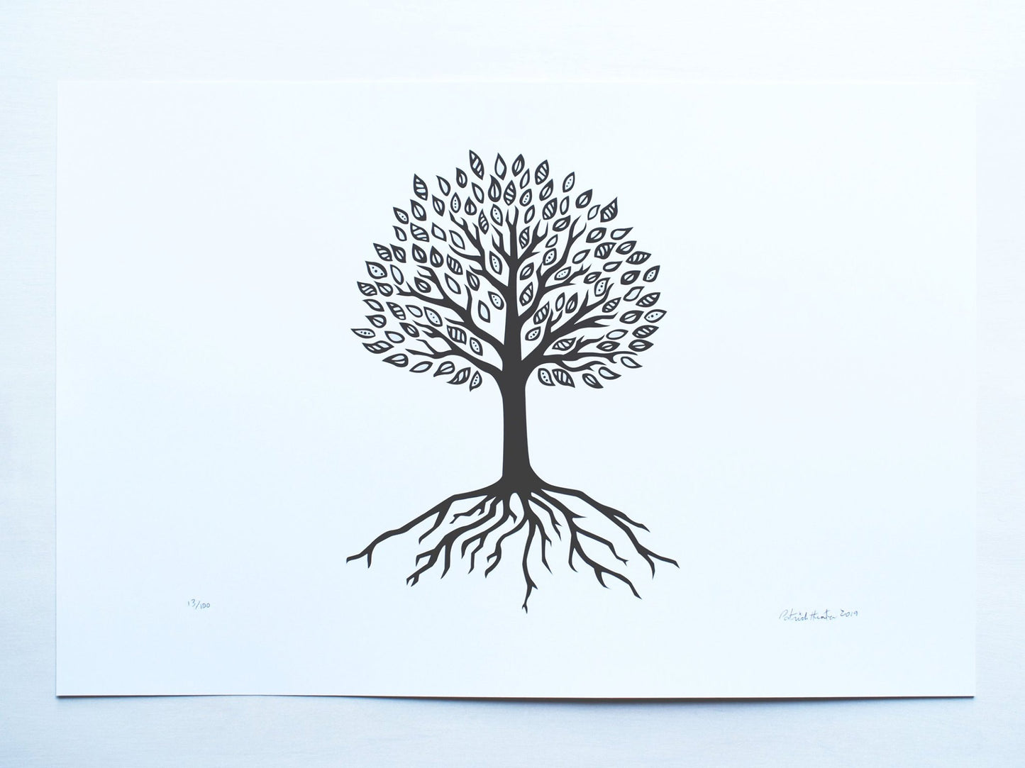 Print of Patrick Hunter's painting of a simplified tree of life, black on white in landscape orientation, woodland art style.